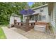 Expansive backyard deck area with hot tub, storage, and outdoor seating, ideal for entertaining at 10808 Greenbriar Dr, Fishers, IN 46037