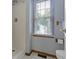 Bathroom featuring a walk-in shower and a window for plenty of natural light at 10808 Greenbriar Dr, Fishers, IN 46037