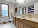 Bathroom with a large mirror at 10808 Greenbriar Dr, Fishers, IN 46037