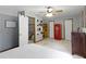 Spacious bedroom with neutral walls and a red telephone booth prop at 10808 Greenbriar Dr, Fishers, IN 46037