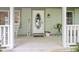 Close up on front porch featuring seating and decor at 10808 Greenbriar Dr, Fishers, IN 46037