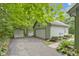 Spacious garage and driveway with ample parking and well-maintained landscaping at 10808 Greenbriar Dr, Fishers, IN 46037