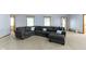 Spacious living room showcasing a comfortable sectional sofa and ample natural light at 10808 Greenbriar Dr, Fishers, IN 46037