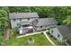 Charming home with an inviting wooden deck, hot tub, and a lush green yard, ideal for relaxation and outdoor activities at 10808 Greenbriar Dr, Fishers, IN 46037