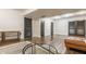 Spacious basement with hardwood floors, recessed lighting, stylish furnishings, and ample room for activities at 11875 Durbin Dr, Carmel, IN 46032