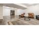 Basement featuring a leather sofa, coffee table, decorative rug and recessed lighting at 11875 Durbin Dr, Carmel, IN 46032