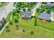 An aerial view of a neighborhood featuring well-maintained homes with lush green lawns and mature trees at 12635 Tuscany Blvd, Carmel, IN 46032
