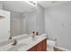 Neutral bathroom features a double sink, tub, and toilet at 12635 Tuscany Blvd, Carmel, IN 46032