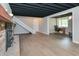 Finished basement featuring a fireplace, stairs, and a separate area perfect for an office space at 138 Plaza Chica St, Greenwood, IN 46143