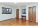Bedroom with hardwood floors, natural light, and a built-in desk at 138 Plaza Chica St, Greenwood, IN 46143