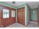 Welcoming entryway features tiled floors, a decorative front door, and a convenient coat closet at 138 Plaza Chica St, Greenwood, IN 46143