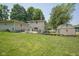 Spacious backyard featuring a patio area for outdoor seating and entertaining and a storage shed at 1524 Northcrest Dr, Anderson, IN 46012