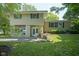 Charming two-story home with green shutters, landscaped front yard and a lovely front entrance at 1524 Northcrest Dr, Anderson, IN 46012