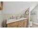 Bright bathroom featuring a double sink vanity with marble countertop and modern faucets at 1623 Hoyt Ave, Indianapolis, IN 46203