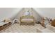 Cozy bedroom features carpet, wooden crib, lots of toys, and a window with bright natural light at 1623 Hoyt Ave, Indianapolis, IN 46203
