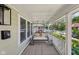 Inviting front porch with a comfortable porch swing, creating a relaxing outdoor space at 1623 Hoyt Ave, Indianapolis, IN 46203