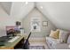 Modern office with lots of natural light, a comfortable sitting area, and vaulted ceilings at 1623 Hoyt Ave, Indianapolis, IN 46203
