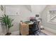 Modern office with a large whiteboard, a comfortable chair, and lots of natural light at 1623 Hoyt Ave, Indianapolis, IN 46203
