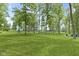 Spacious backyard with a fire pit, barn and home, ideal for outdoor activities at 17320 Joliet Rd, Westfield, IN 46074