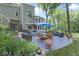 Backyard patio with dining and lounge area is perfect for outdoor entertaining at 17320 Joliet Rd, Westfield, IN 46074