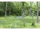 Fire pit and blue Adirondack chairs for relaxing and entertaining outdoors at 17320 Joliet Rd, Westfield, IN 46074