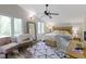 Bright primary bedroom with great natural light, ceiling fan, and comfortable decor at 17320 Joliet Rd, Westfield, IN 46074