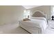 Bedroom featuring a white wooden bed frame, windows and light colored walls at 17320 Joliet Rd, Westfield, IN 46074