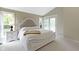 Cozy bedroom with white wooden bed frame and doors to a private balcony at 17320 Joliet Rd, Westfield, IN 46074