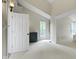 Bright bedroom featuring vaulted ceilings, neutral walls, and a sunny window at 17320 Joliet Rd, Westfield, IN 46074