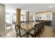 Open concept dining room and kitchen with brick columns dividing the rooms at 17320 Joliet Rd, Westfield, IN 46074