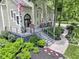 Charming two-story home with landscaped yard and a beautiful porch, perfect for relaxing outdoors at 17320 Joliet Rd, Westfield, IN 46074