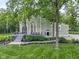 Charming two-story home with a landscaped front yard and inviting porch at 17320 Joliet Rd, Westfield, IN 46074