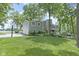 Stately home with a three-car garage, a basketball hoop, and a large backyard at 17320 Joliet Rd, Westfield, IN 46074