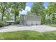 Exterior view of the home's three-car garage and spacious driveway at 17320 Joliet Rd, Westfield, IN 46074