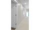 Bright hallway showcasing neutral-toned walls, modern lighting, and doorways leading to other rooms at 17320 Joliet Rd, Westfield, IN 46074