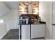 Contemporary kitchenette featuring light-colored walls, stylish decor, and modern appliances at 17320 Joliet Rd, Westfield, IN 46074
