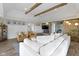 Spacious living area with stone fireplace, wood beams, and ample seating for a relaxed atmosphere at 17320 Joliet Rd, Westfield, IN 46074