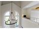Charming loft space with vaulted ceilings, arched windows, and a view of the surrounding landscape at 17320 Joliet Rd, Westfield, IN 46074