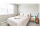 Serene bedroom featuring carpet floors and natural light from a large window, providing a peaceful retreat at 1758 Pelham Dr, Greenwood, IN 46143