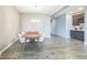 Bright and airy dining room adjacent to the service bar perfect for entertaining and Gathering gatherings at 1758 Pelham Dr, Greenwood, IN 46143