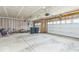 Spacious two car garage with high ceilings, windows, garage door openers, and an abundance of potential at 1758 Pelham Dr, Greenwood, IN 46143