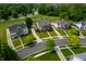 Aerial view of homes in a neighborhood featuring mature trees and grassy lawns at 17877 Kinder Oak Dr, Noblesville, IN 46062