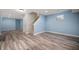 Spacious basement with stairs and neutral walls and wood floors at 17877 Kinder Oak Dr, Noblesville, IN 46062