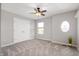 Neutral bedroom with carpet, ceiling fan, and window with natural light at 17877 Kinder Oak Dr, Noblesville, IN 46062