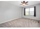 Bedroom featuring carpet, a ceiling fan, and natural light from a window at 17877 Kinder Oak Dr, Noblesville, IN 46062