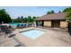 Community pool area featuring a hot tub, seating, and a covered lounge area at 17877 Kinder Oak Dr, Noblesville, IN 46062