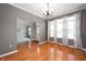 Spacious living room with hardwood floors, natural light, and neutral tones at 17877 Kinder Oak Dr, Noblesville, IN 46062