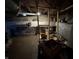 Unfinished basement area with exposed pipes and some stored items at 1809 E 13Th St, Muncie, IN 47302