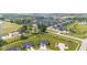 Aerial view of the community featuring meticulously landscaped streets and a water tower at 19387 Astoria Ave, Sheridan, IN 46069