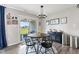 Cozy breakfast nook with a round table and view to the outdoor patio at 19387 Astoria Ave, Sheridan, IN 46069